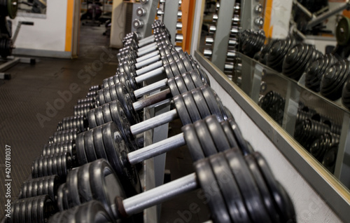 dumbbells on the rack in the gym
