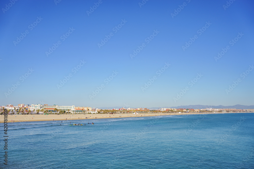 Fototapeta premium Panoramic view of the Malvarrosa Beach in Valencia Spain with big copy space.