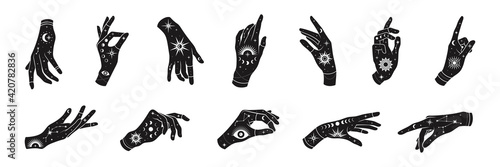 Vector set of woman hands with mystical magic symbols-eyes, sun, phrases of moon, stars, jewels. Spiritual occultism objects, templates for logo design.