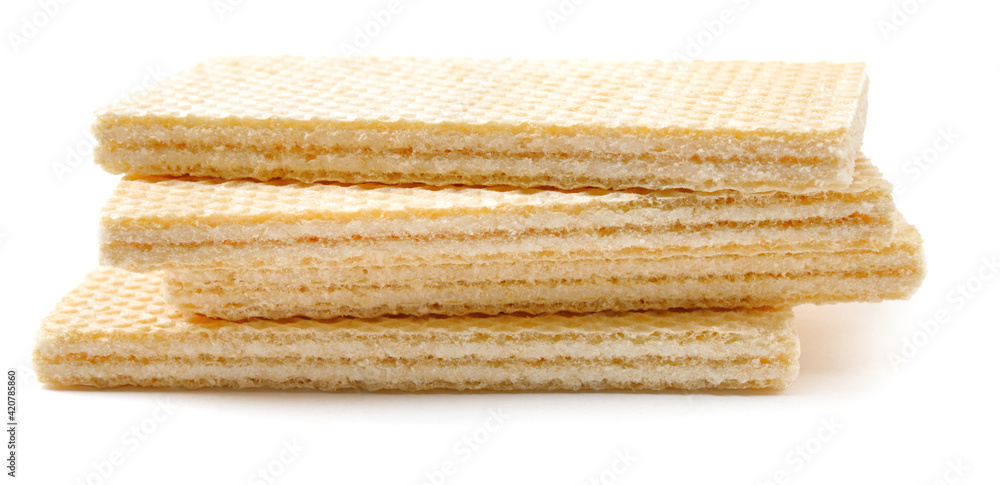 Several crisp waffles are isolated on a white background. Several crisp waffles are isolated on a white background.
