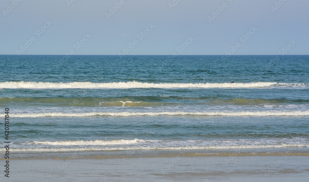 Beautiful view of the surf in New Smyrna Beach on the Atlantic Ocean, Volusia County, Florida