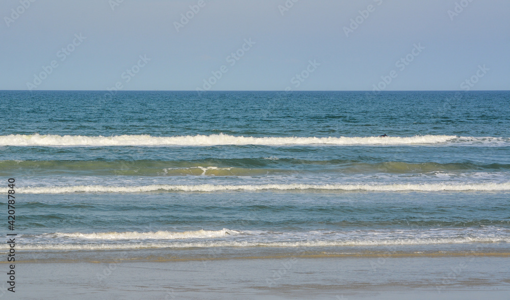 Beautiful view of the surf in New Smyrna Beach on the Atlantic Ocean, Volusia County, Florida Beautiful view of the surf in New Smyrna Beach on the Atlantic Ocean, Volusia County, Florida