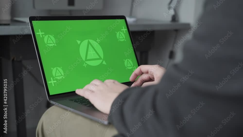 Laptop with green screen chroma. Mockup. Telecommuting, sending and receiving messages. Close-up. Laptop with green screen chroma. Mockup. Telecommuting, sending and receiving messages. Close-up.