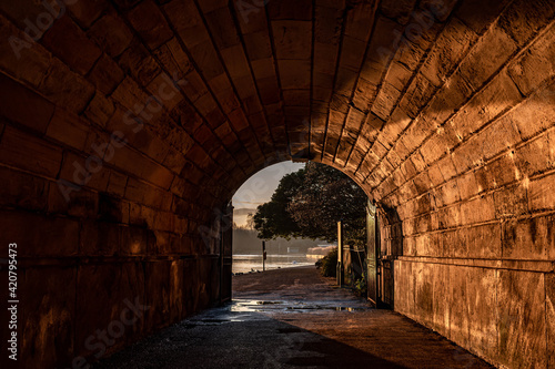 Sunlight and shadow seen from under the bridge  Hyde Park London  UK