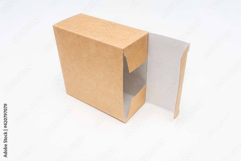 Open cardboard box, white background, copy space Open cardboard box, white background, copy space