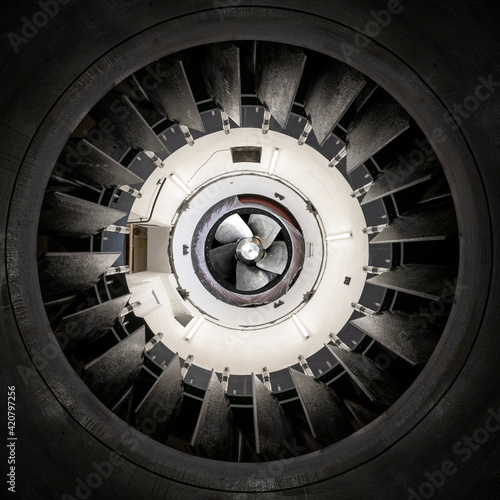 Bottom up view of a Kaplan turbine and guide vanes of a hydropower plant © A2LE