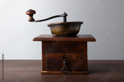 Vintage manual hand coffee grinder for grinding coffee beans.