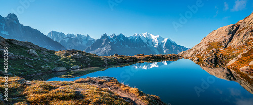 Obraz na płótnie Sunset panorama of the Lac Blanc lake with Mont Blanc (Monte Bianco) on background, Chamonix location. Beautiful outdoor scene in Vallon de Berard Nature Reserve, France w salonie