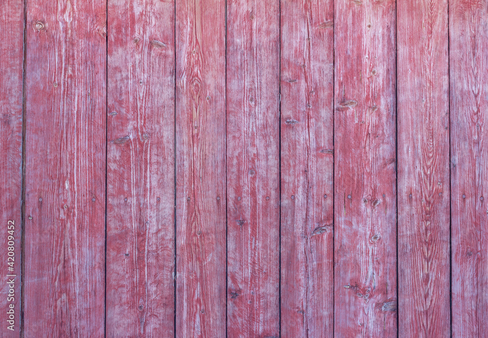 Old wooden background with peeling red paint Old wooden background with peeling red paint