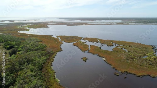 Backward flight over lake in Gippsland, Victoria, Australia