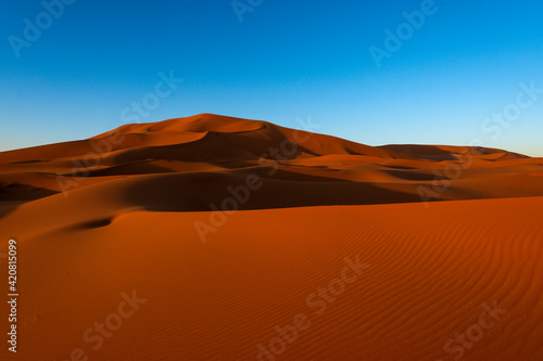 Scenic view of the beautiful Erg Chebbi dunes at dawn, in Morocco, North Africa