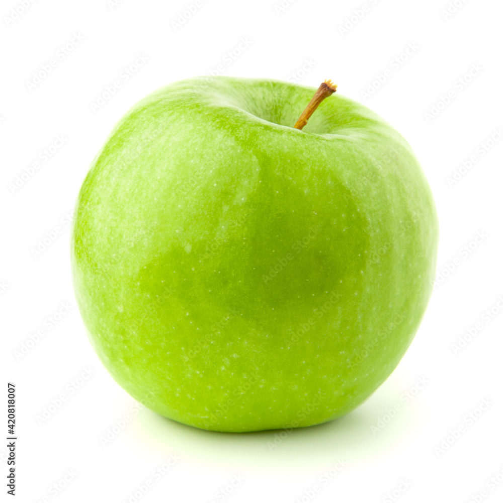 Green apple on a white background with a shadow. Green apple on a white background with a shadow.