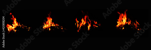 The set of 4 thermal energy flames image set on a black background. Yellow red heat energy
