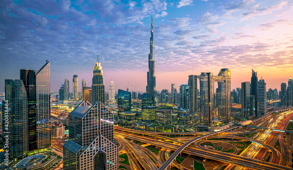 Dubai city center - amazing city skyline with luxury skyscrapers at sunrise, United Arab Emirates