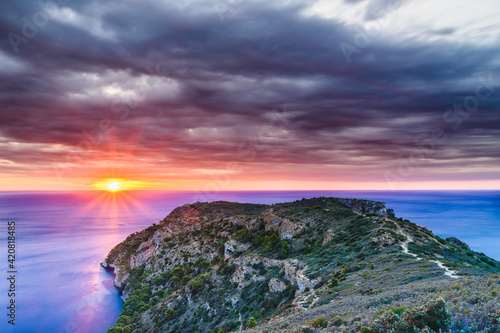 Fényképezés Sunrise over the sea (Mediterranean Sea, Cap Norfeu, Spain)
