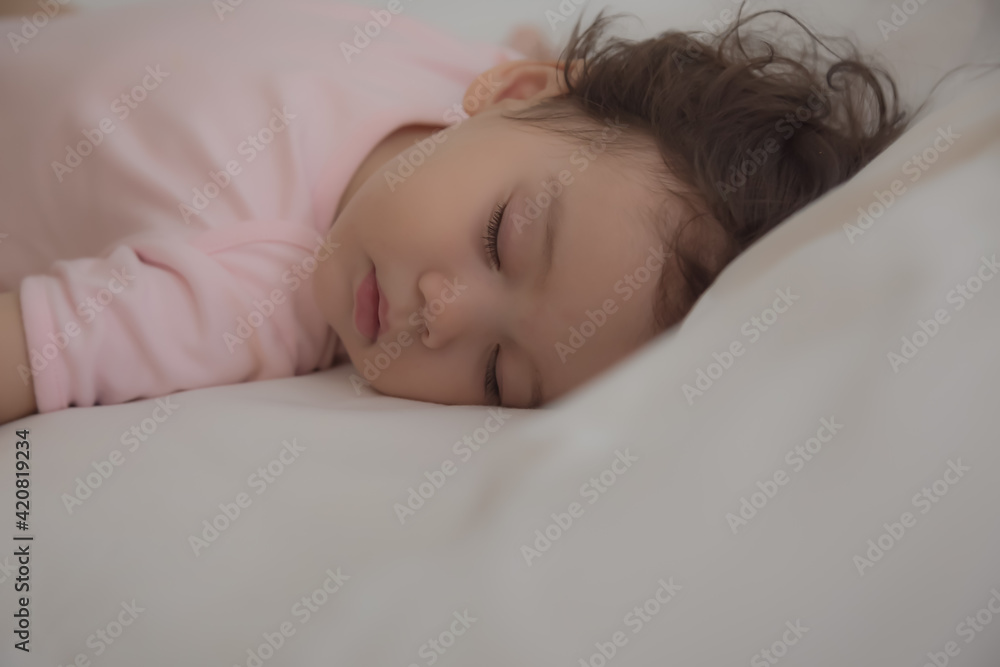 Adorable cute child sleeping on bed at night with sweet dream in bedroom Lovely toddler child get deep sleep and get relax and happy during lay down on bed Little toddler girl get good sleep Adorable cute child sleeping on bed at night with sweet dream in bedroom Lovely toddler child get deep sleep and get relax and happy during lay down on bed Little toddler girl get good sleep