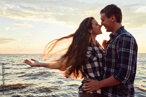 Happy couple at a lake © Ryzhkov Oleksandr