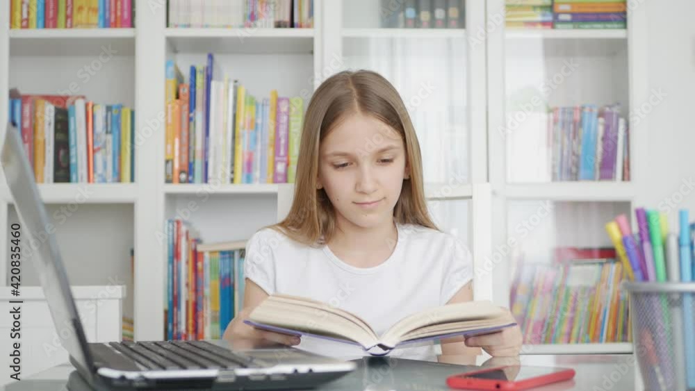 Kid Reading a Book, Child Learning for Homework School, Schoolgirl Studying from Home in Coronavirus Pandemic, Online Education Kid Reading a Book, Child Learning for Homework School, Schoolgirl Studying from Home in Coronavirus Pandemic, Online Education