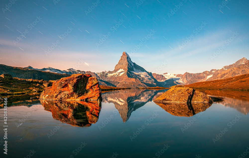 View on mountain Matterhorn (4478 m) at sunrise in Valais region, Switzerland, Europe