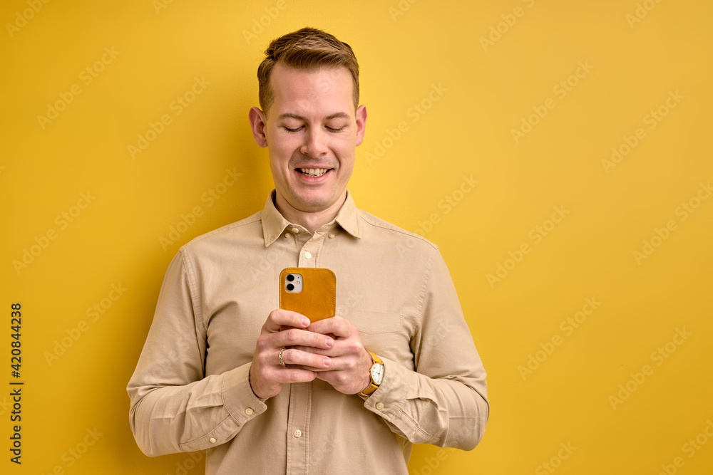 nice european man holding smartphone in hands creating social strategy influencer thinking nice european man holding smartphone in hands creating social strategy influencer thinking