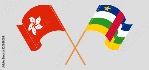 Crossed and waving flags of Hong Kong and Central African Republic