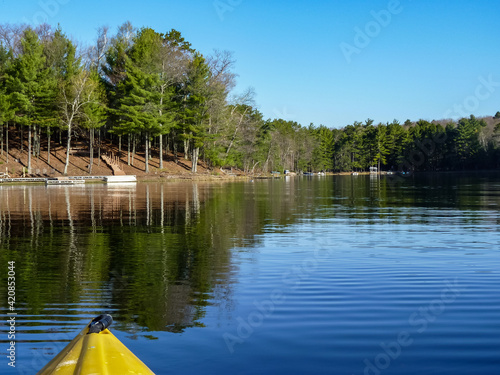 kayak on calm lake up north