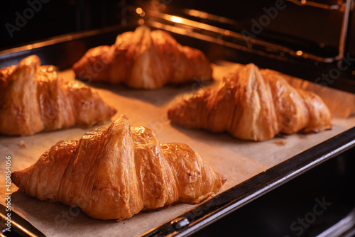 French croissants are baked in the oven.