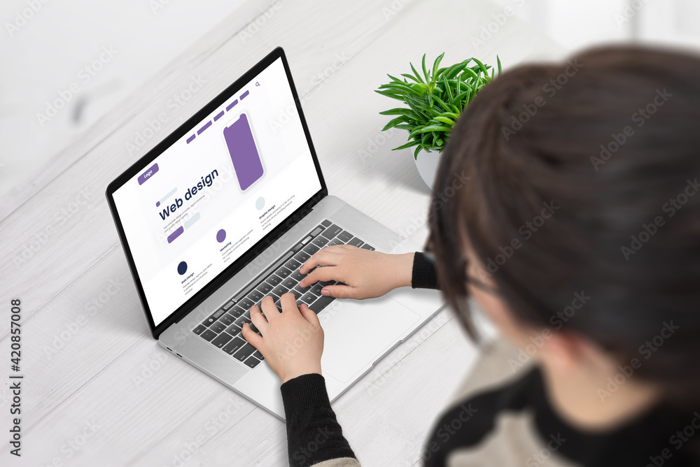Web designer work on laptop computer on webpage layout concept Web designer work on laptop computer on webpage layout concept