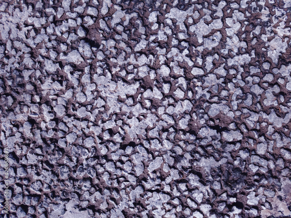 textured stone wall with splashes of gray ice textured stone wall with splashes of gray ice