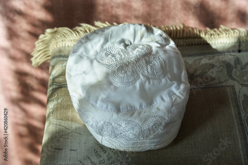 Photography Prayer cap islam on fabric.