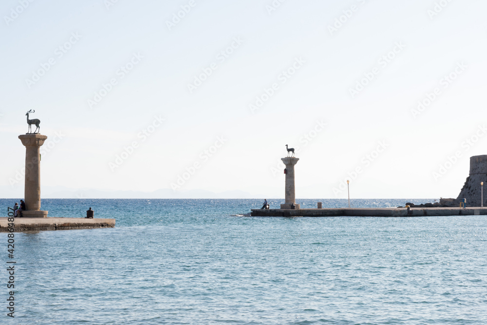 Deer statues welcoming to Rhodes harbor, Rhodes Town, Dodecanese, Greece Deer statues welcoming to Rhodes harbor, Rhodes Town, Dodecanese, Greece