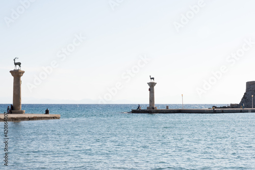 Deer statues welcoming to Rhodes harbor, Rhodes Town, Dodecanese, Greece