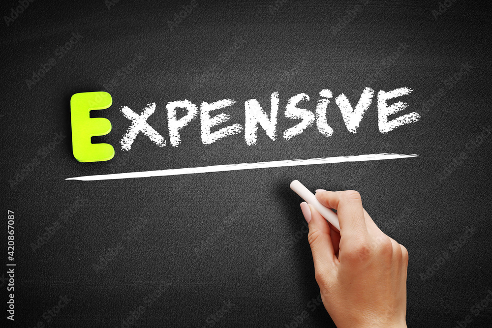 Expensive text on blackboard, concept background Expensive text on blackboard, concept background