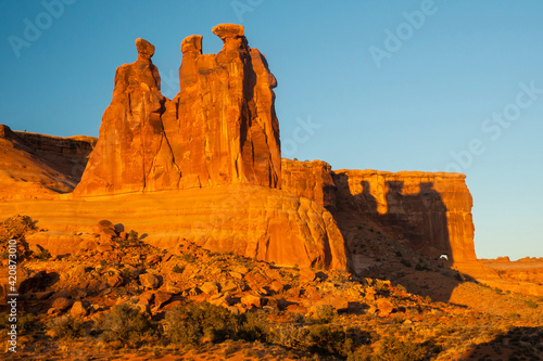 USA, Utah, Arches National Park. The Three Gossips formation at sunrise.