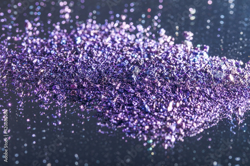 KMnO4 - Purple vivide crystals. (latin: Potassium permanganate). Colorful background. photo