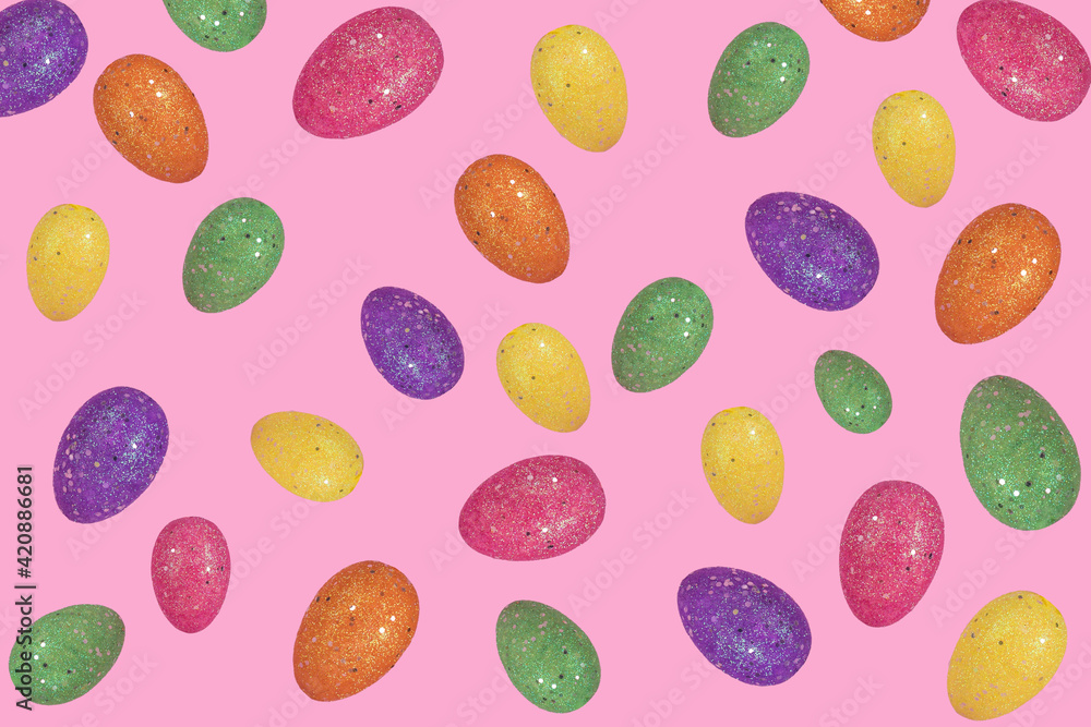 Creative Easter lidea with flying colorful eggs on light pink background.