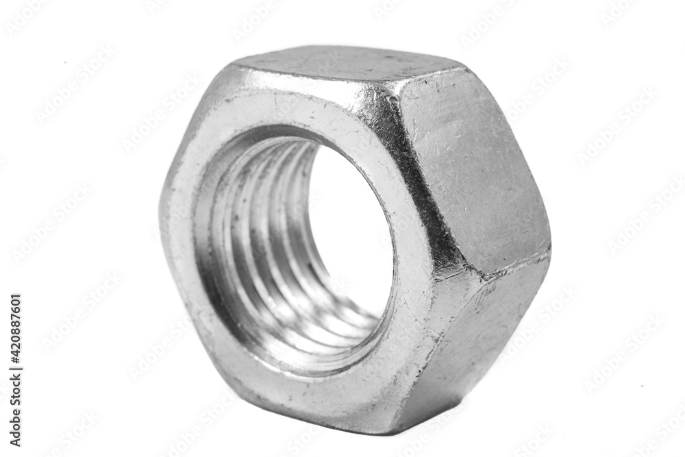 Metal nut with metric thread. Metal accessories for assembling metal parts. Metal nut with metric thread. Metal accessories for assembling metal parts.