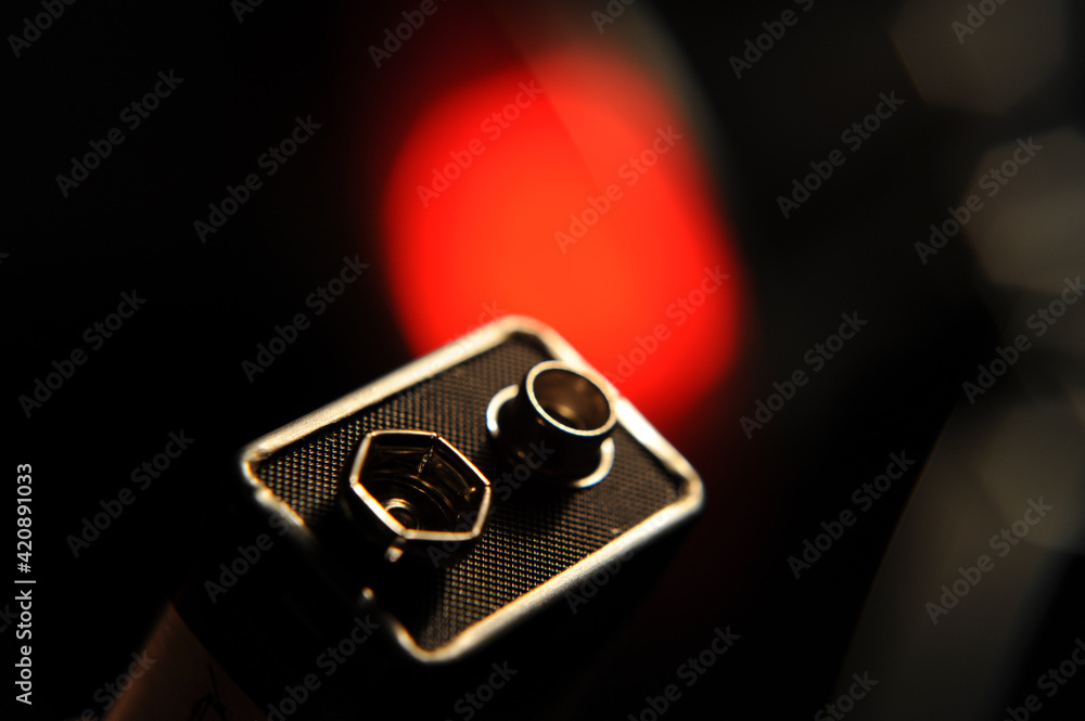 Nine-volt alkaline battery positive and negative terminals Nine-volt alkaline battery positive and negative terminals