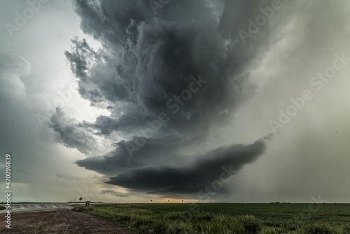 Dark and ominous severe storm with large hail moving southeast, North Dakota, USA photo