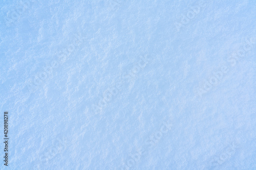 Blue snow with texture. fresh snow background