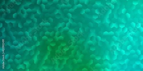 Light green vector pattern with hexagons.