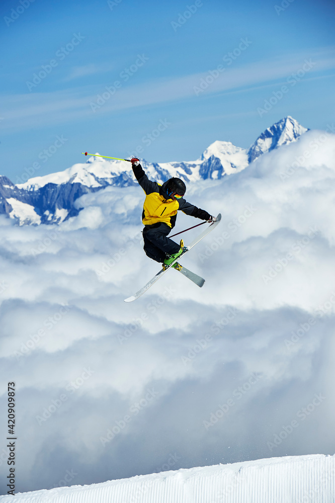 Skier in midair, Saas-Fee, Valais, Switzerland Skier in midair, Saas-Fee, Valais, Switzerland