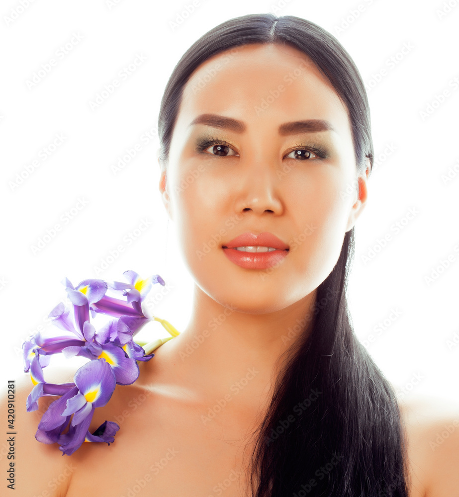 young pretty real asian woman with flower purple orchid isolated on white background spa, healthcare concept
