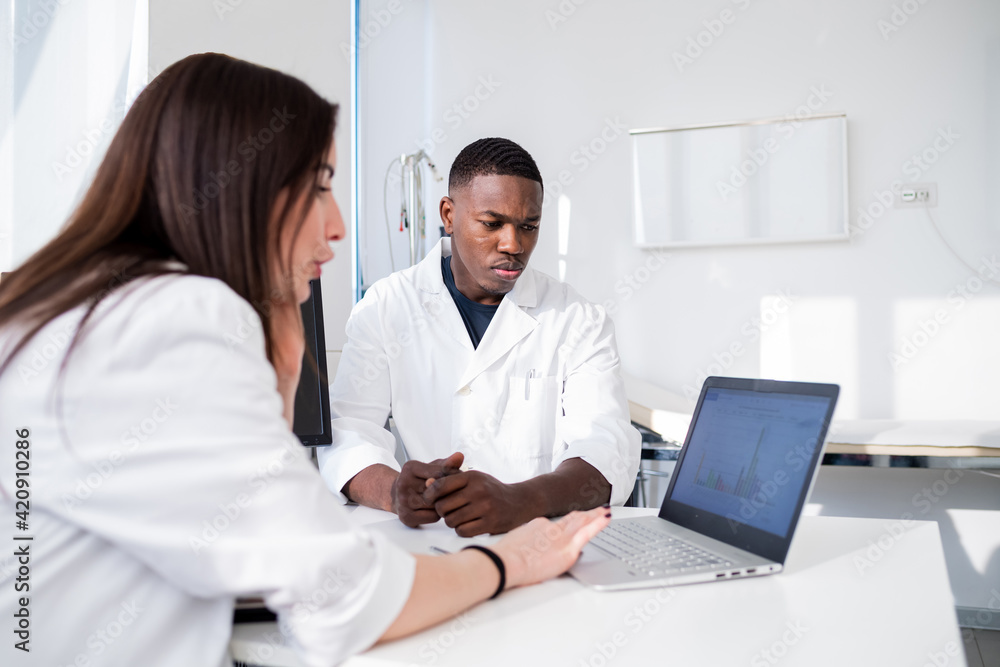 Doctors having discussion in meeting room Doctors having discussion in meeting room
