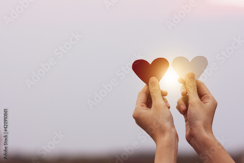 hand holding red heart on sky copy spec, Red heart love in valentine's day, World heart day