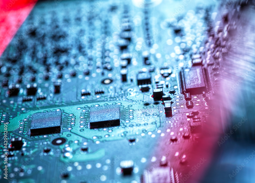 Laptop computer hardware, A computer virus attacking and erasing the hardware of laptop computer, close up Laptop computer hardware, A computer virus attacking and erasing the hardware of laptop computer, close up