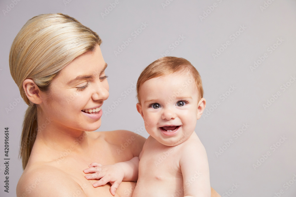 Portrait of mother and baby boy
