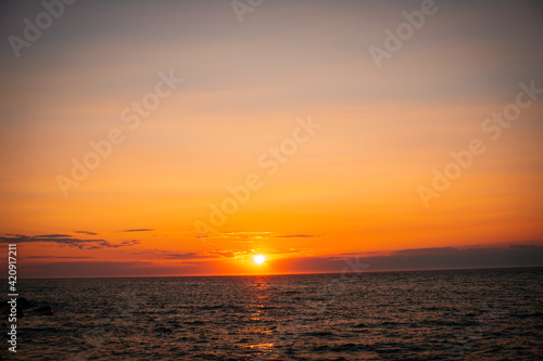 sunrise over the sea © Ashek