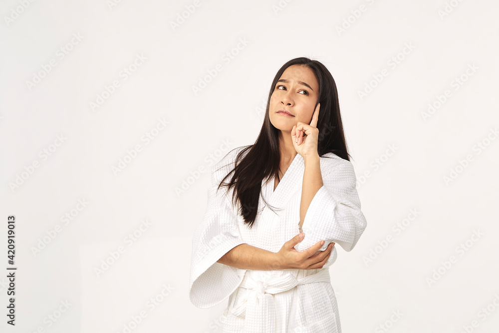 Beautiful girl wearing white bathrobe Beautiful girl wearing white bathrobe