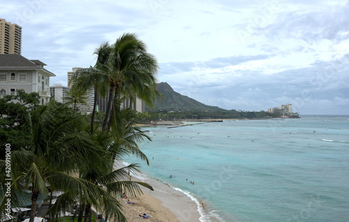 Diamond Head and Waikiki as seen from a beach side resort Hotel.